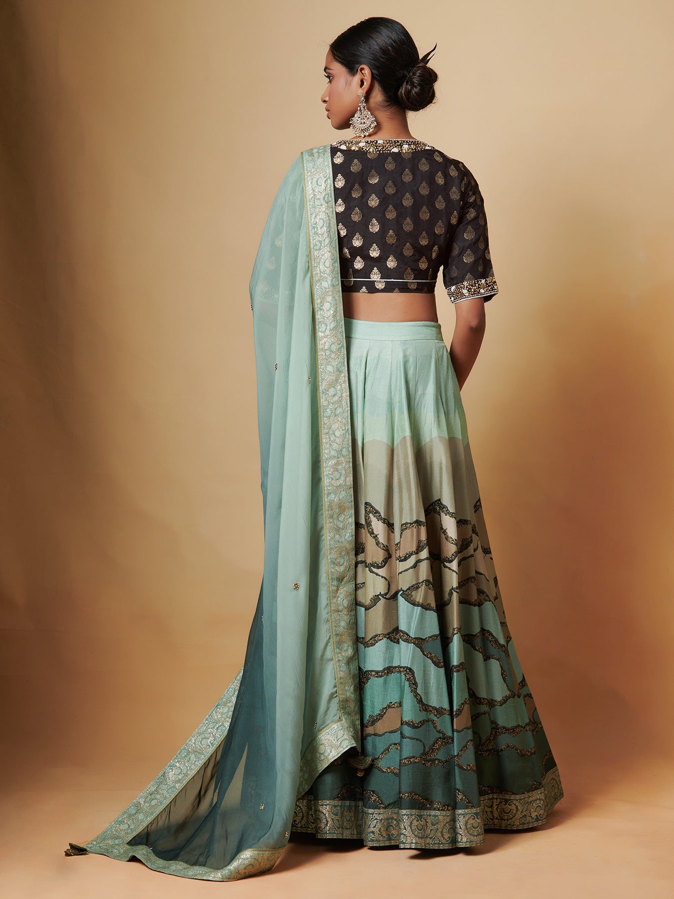 Agni Teal Lehenga Set in Raw Silk